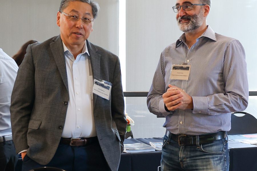 Larry Nagahara, Vice Dean for Research and Translation, JHU WSE, stands beside Vincent Ponzo, Amazon.